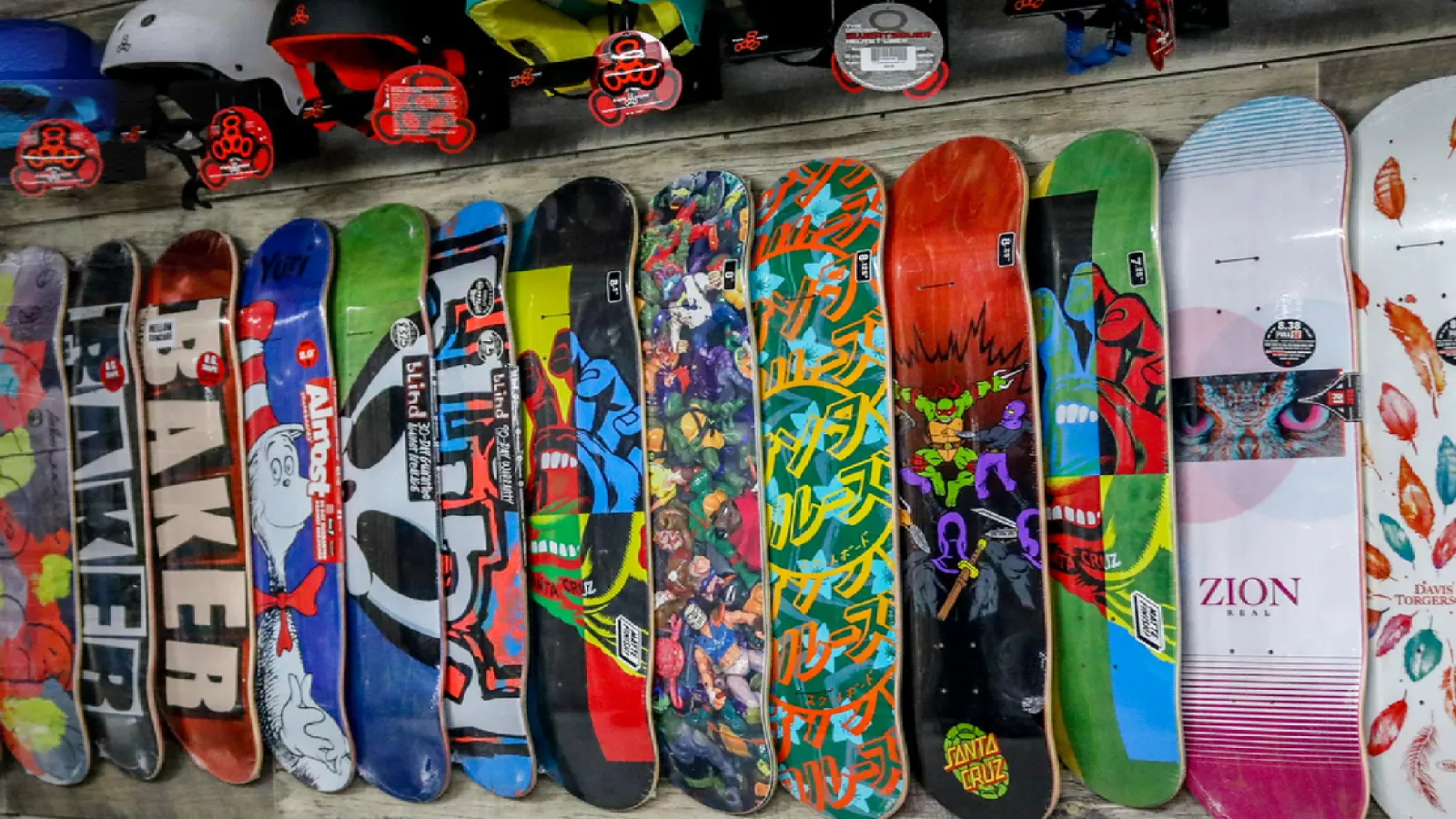 Skateboard decks and helmets on sale at KTR.